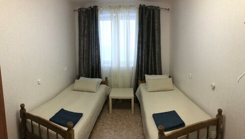 Номер эконом с 2 односпальными кроватями в Персона