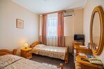 Номер стандарт с 2 односпальными кроватями в Саратовская