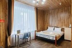Улучшенный четырехместный номер в A-House Hotel