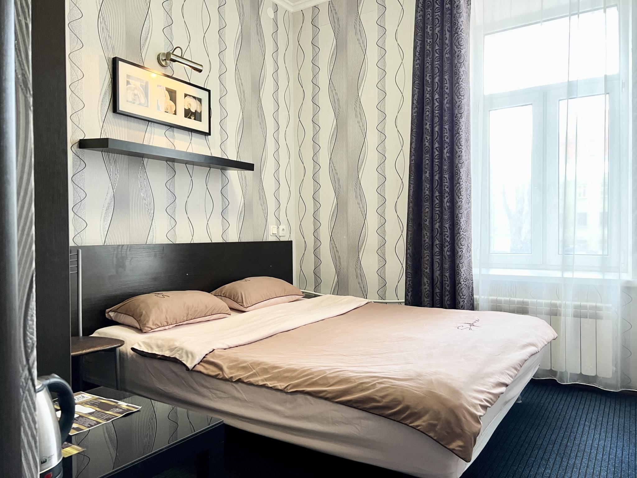 Номер эконом стандарт с 1 двуспальной кроватью