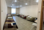 Кровать в общем номере с пятью кроватями в Парнас