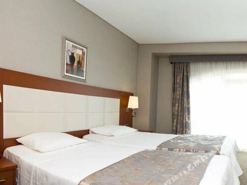 Четырёхместный номер Standard в Innpera Hotel