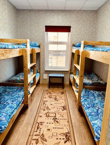 Кровать в общем номере для мужчин в Siberia