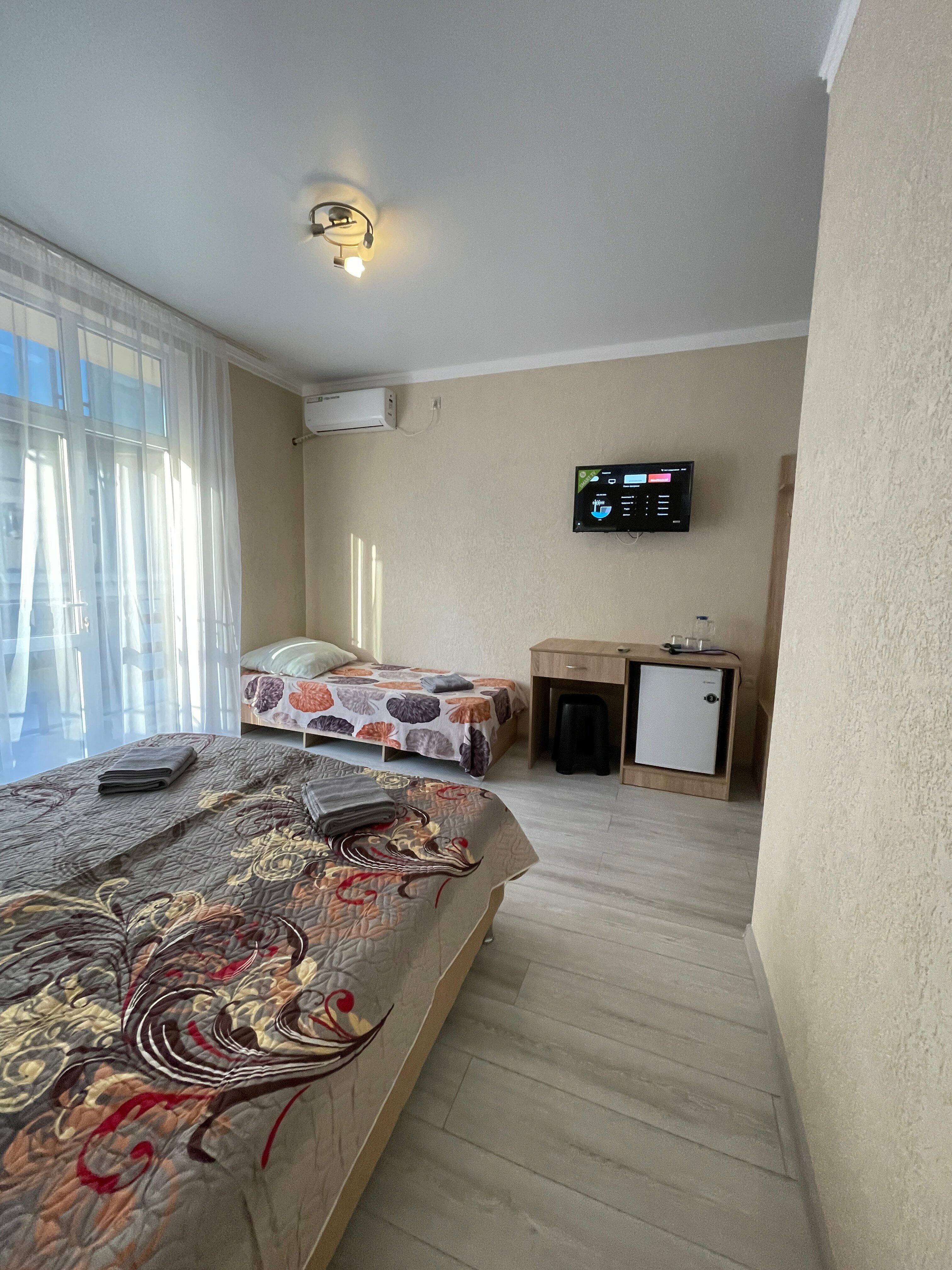 Трехместный номер с балконом