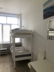Кровать в общем номере для мужчин с 4 кроватями в Пастель