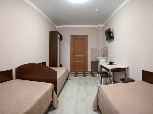 Односпальная кровать в общем номере для женщин