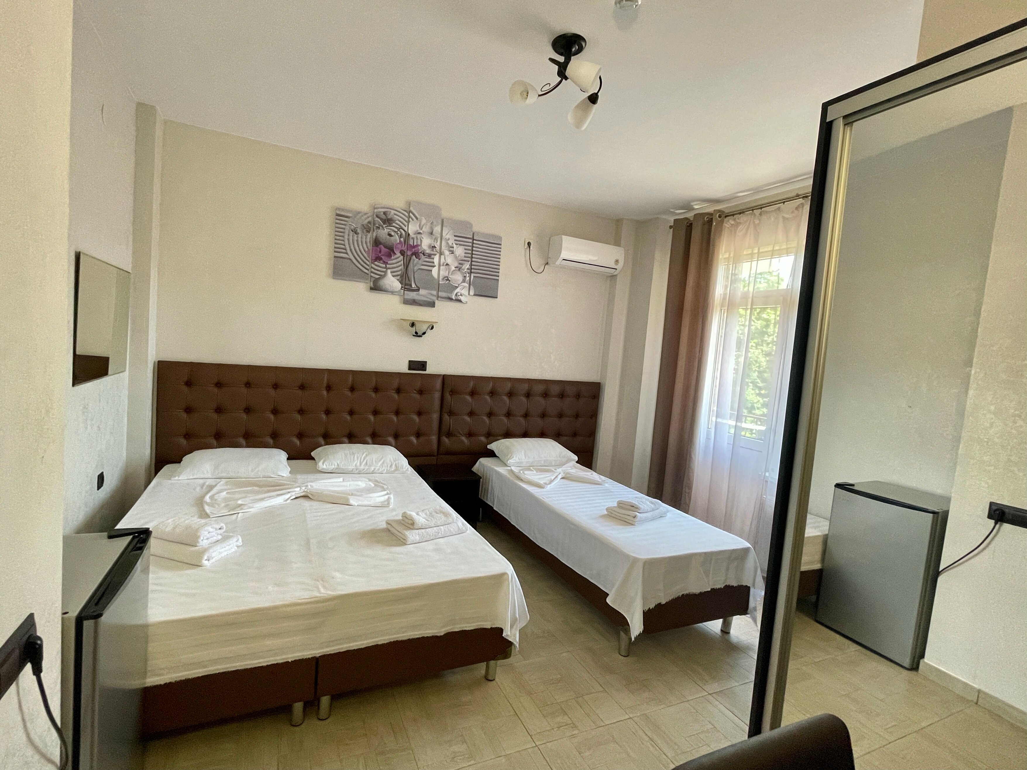 Трехместный номер Делюкс