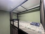 Кровать в общем 8-местном номере в Арис