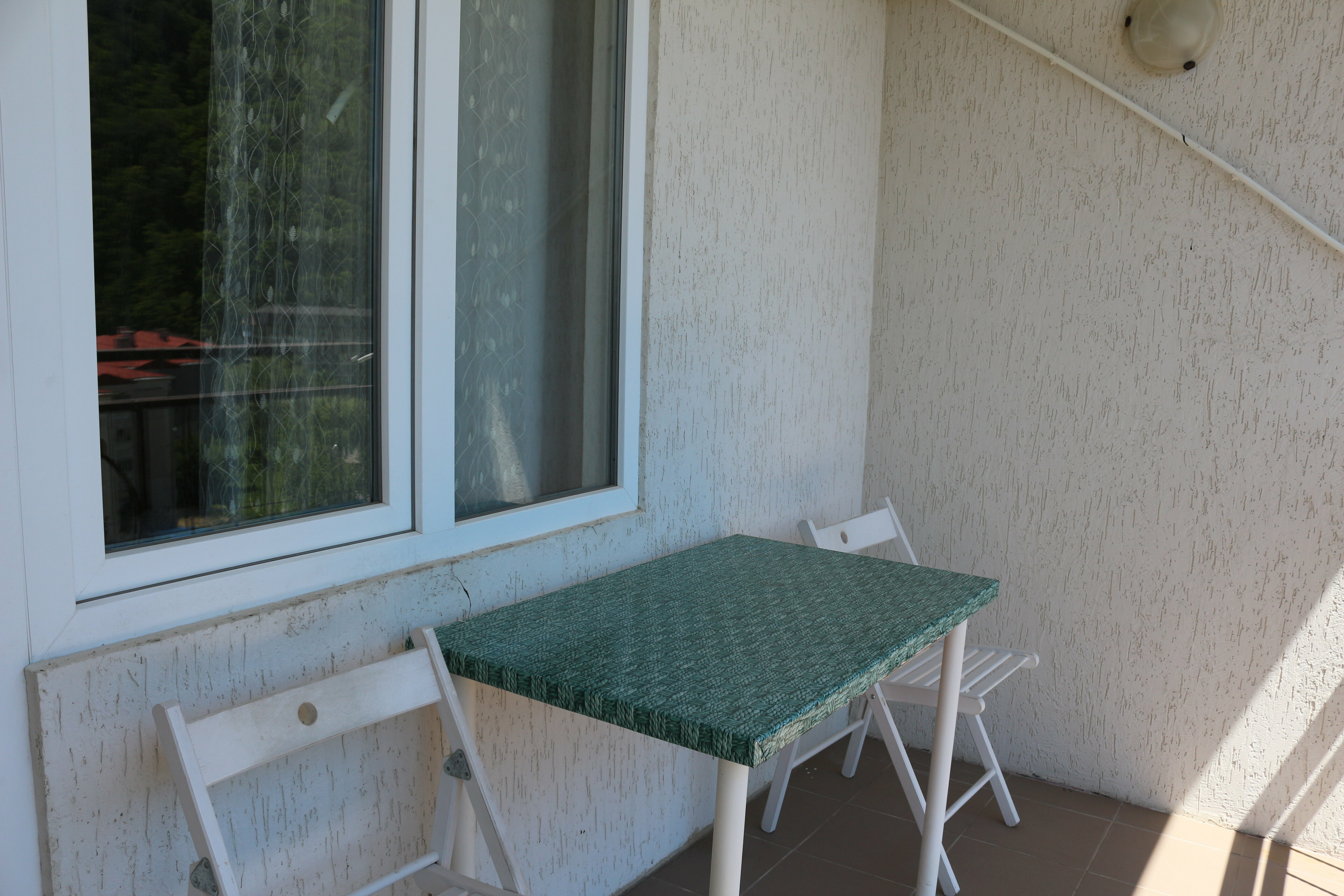 Трехместный номер с балконом