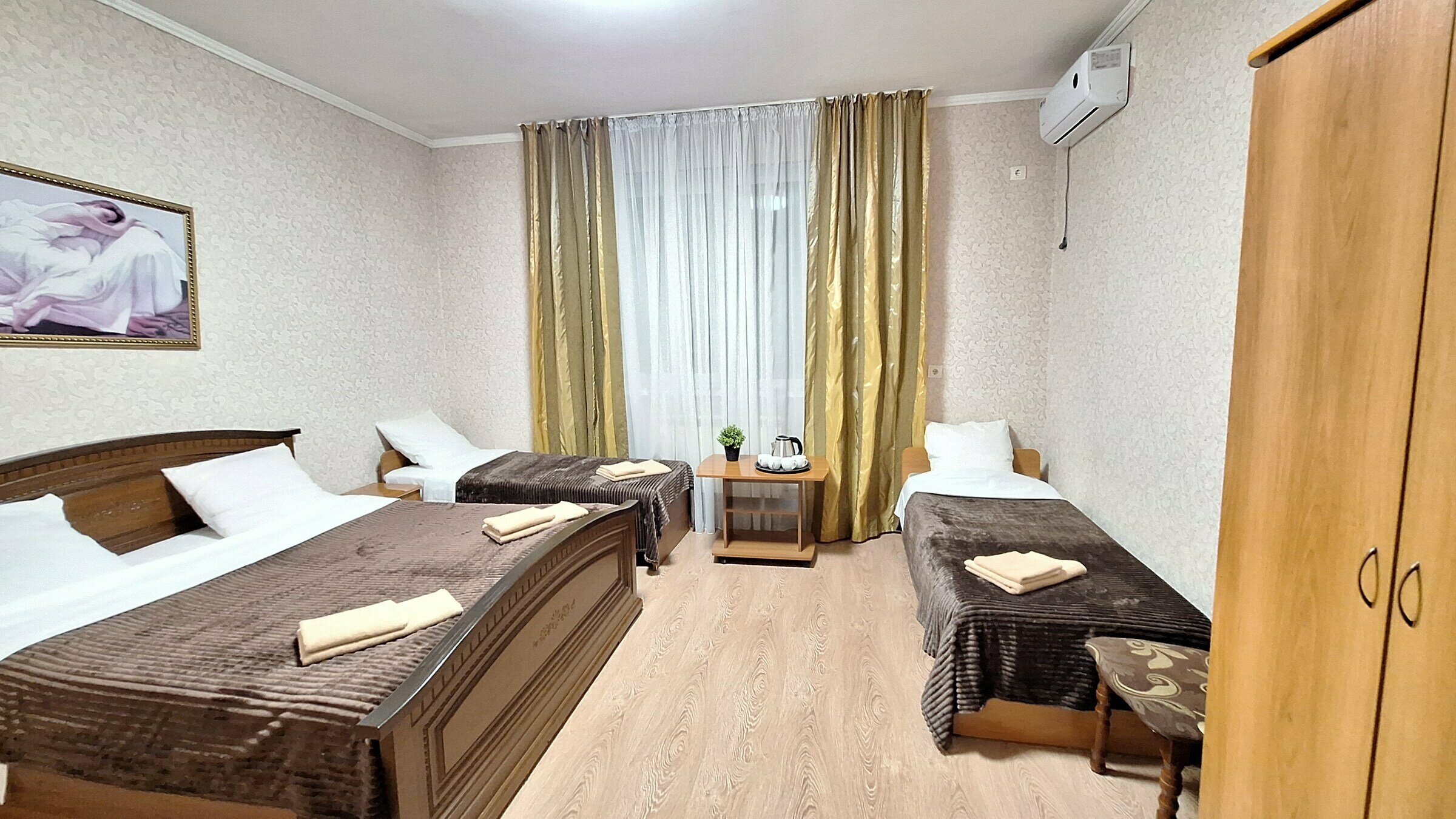 Улучшенный четырехместный номер