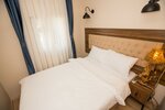 Стандартный трехместный номер в Corner Garden Hotel