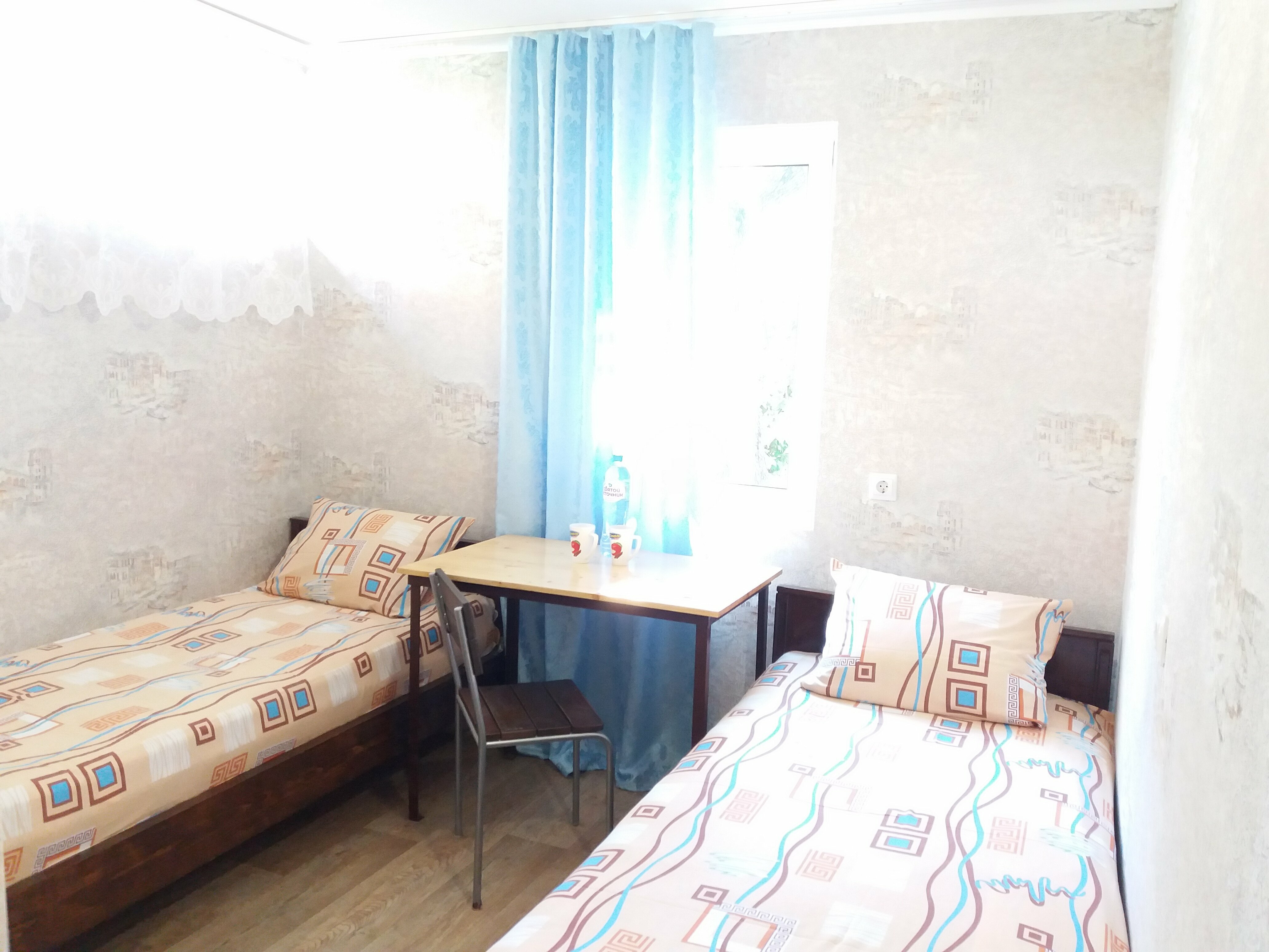 Двухместный номер с 2 отдельными кроватями и душем