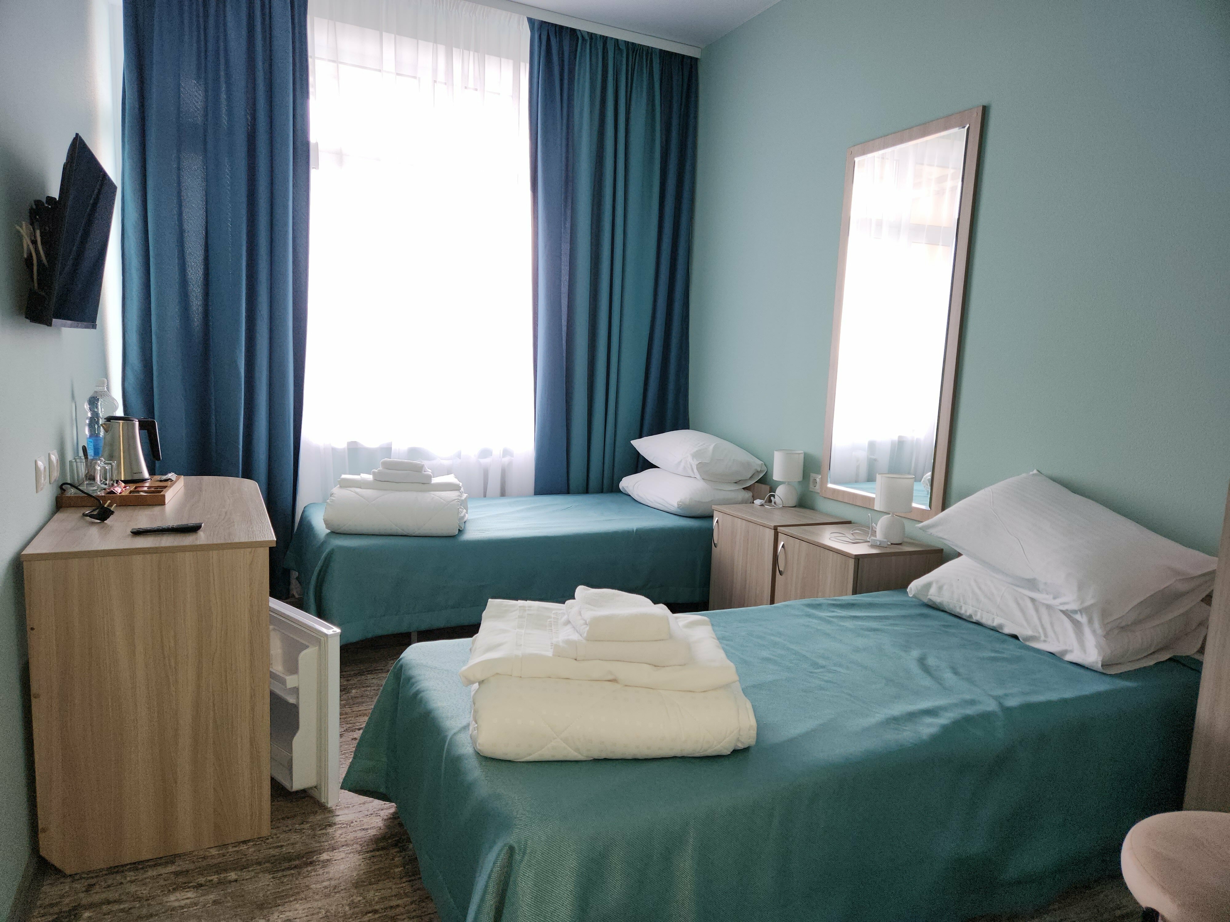 Двухместный номер с 2 отдельными кроватями и балконом