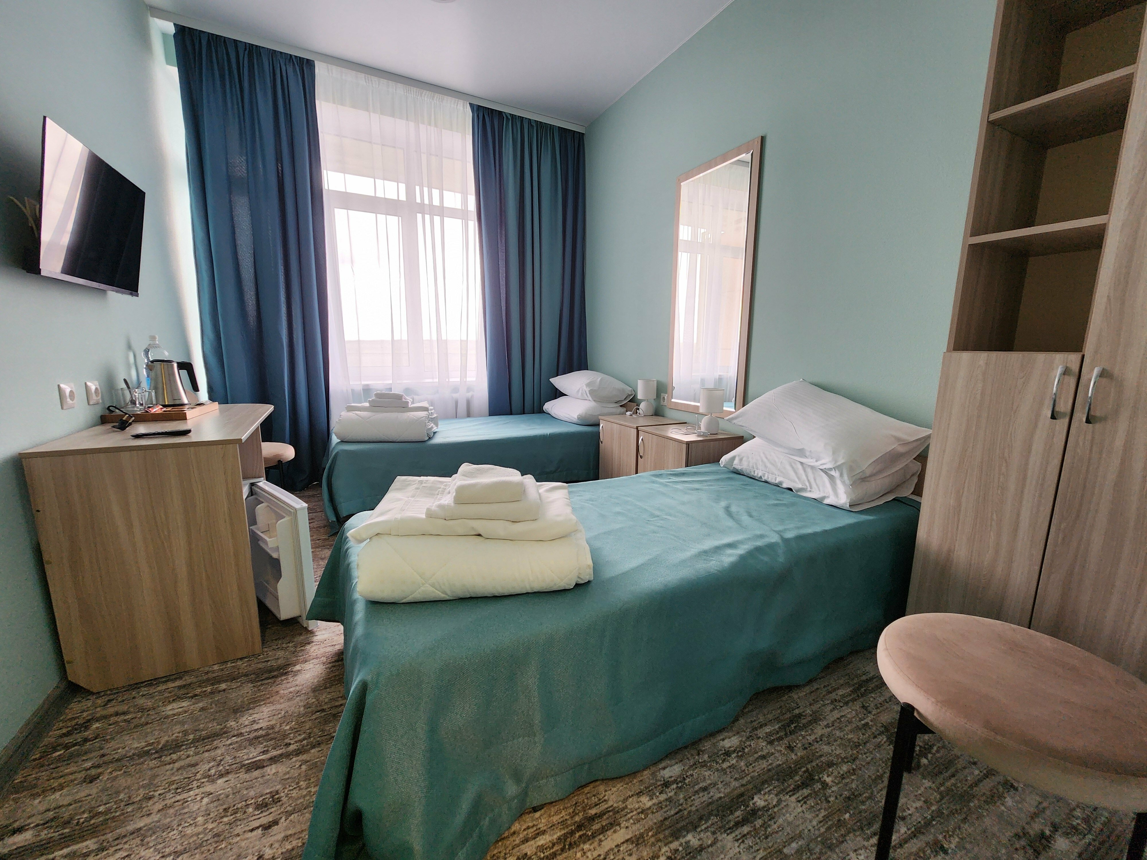 Двухместный номер с 2 отдельными кроватями и балконом