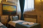 Deluxe Triple Cave Room в Emit Cave Hotel