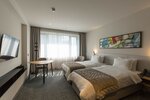 Улучшенный двухместный номер с 2 односпальными кроватями в Отель Mona Plaza