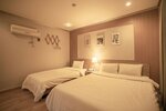 Двухместный номер «Делюкс» с 2 односпальными кроватями в Jeju Stay Hotel