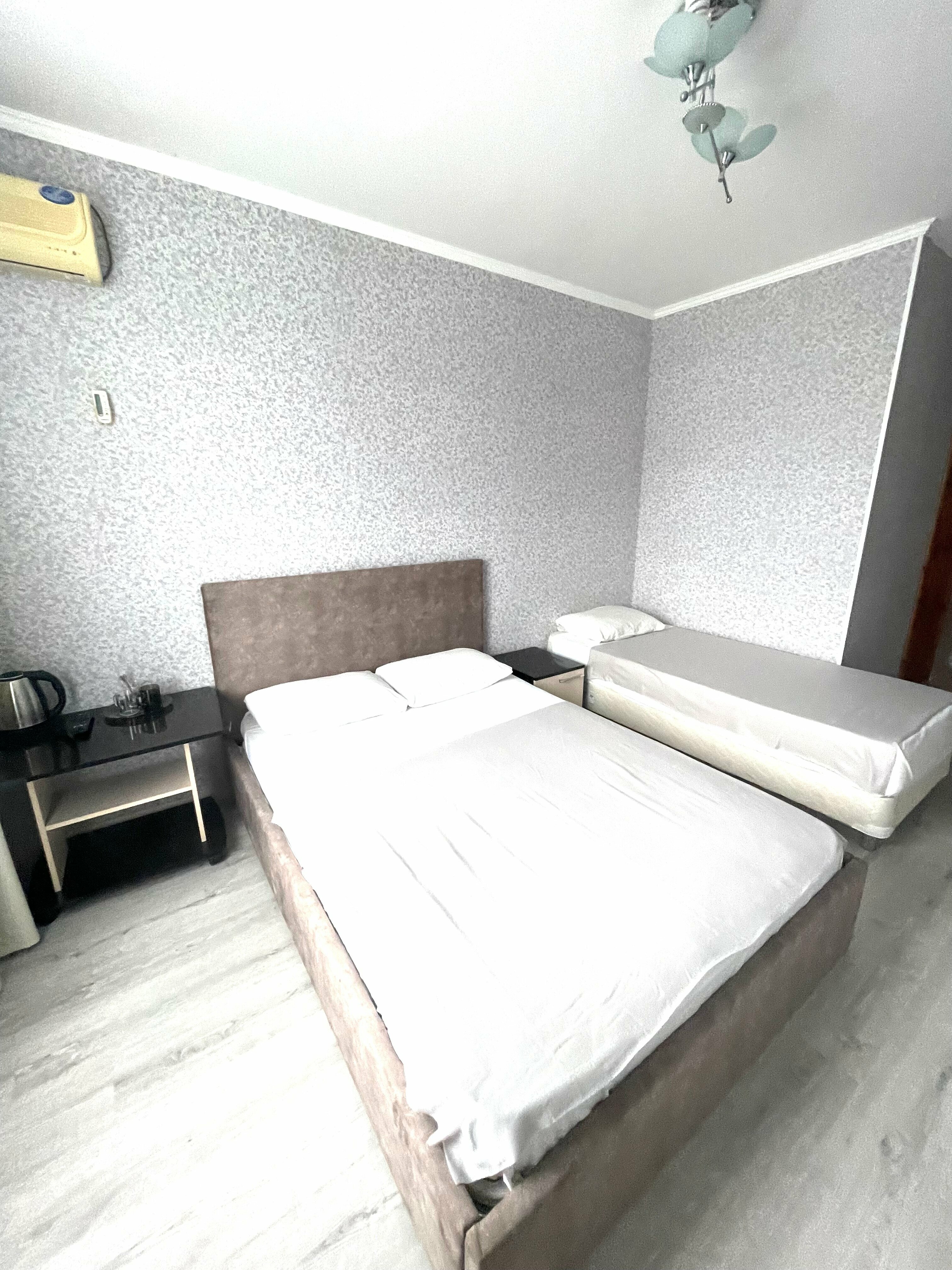 Трехместный номер с балконом