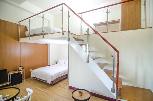 Семейный четырехместный номер, вид на город в Anping Kensington Hotel