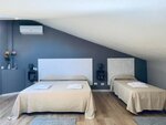 Дизайнерский трехместный номер в Domus Regia