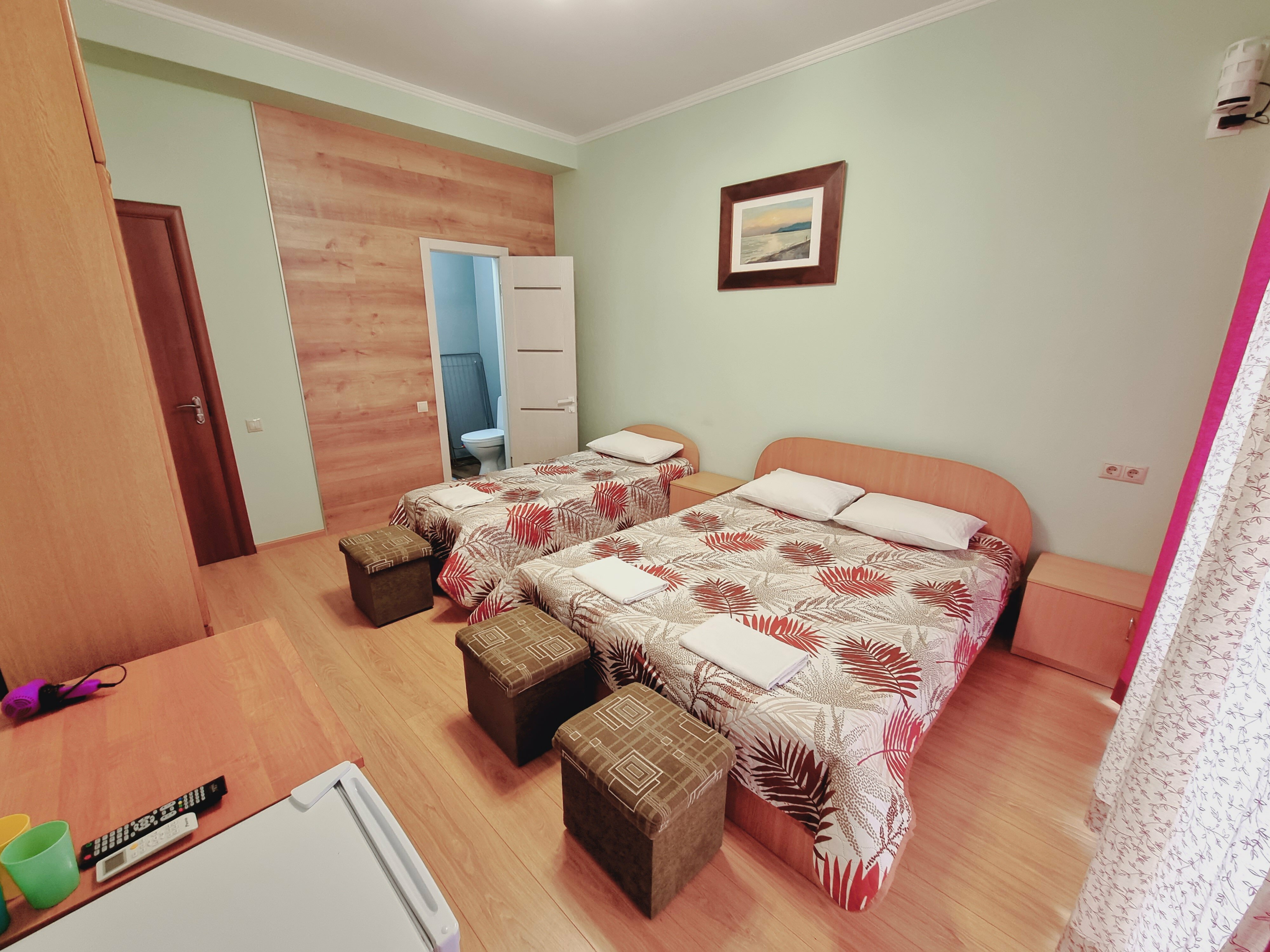 Трехместный номер с балконом