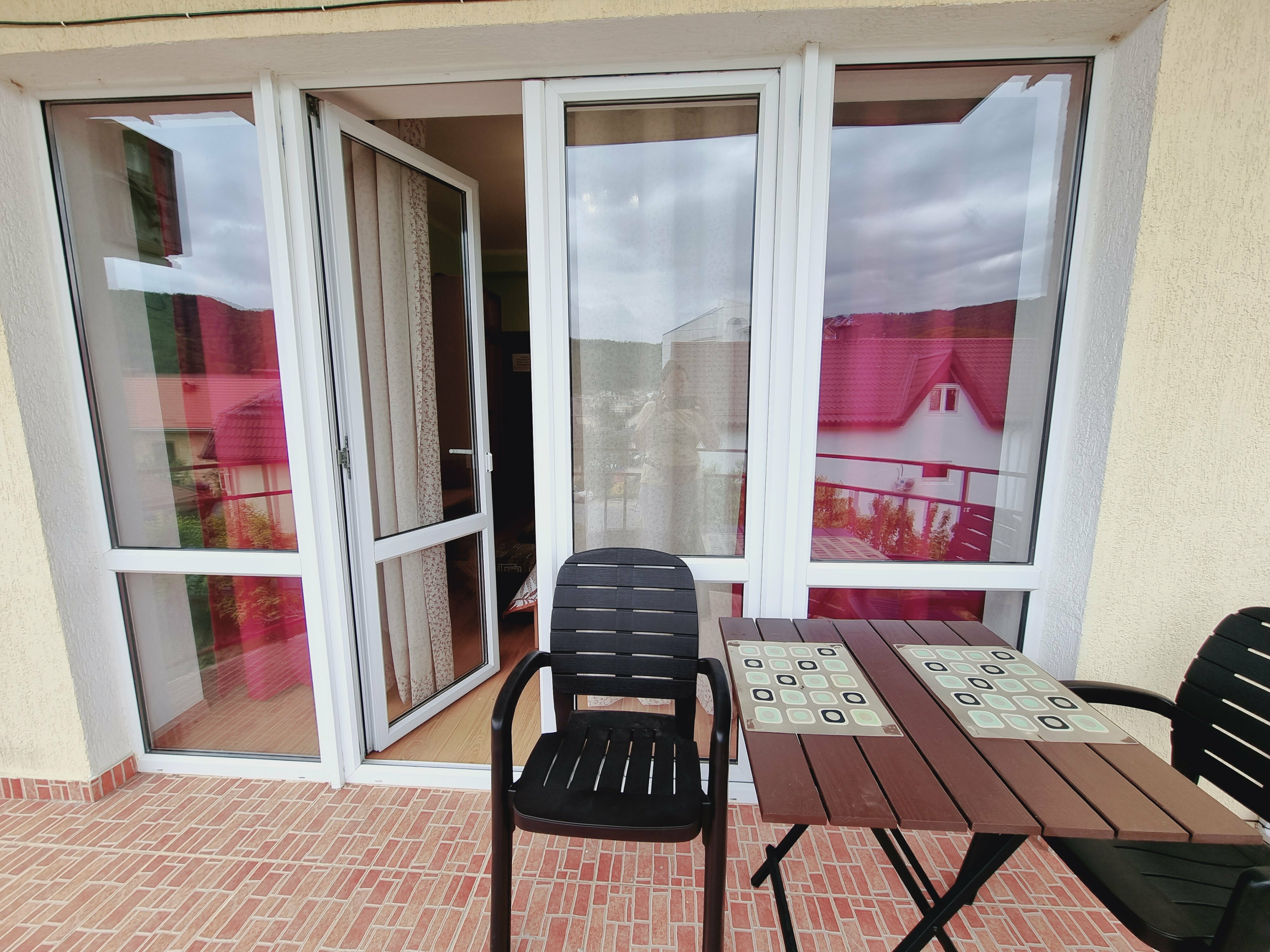 Трехместный номер с балконом