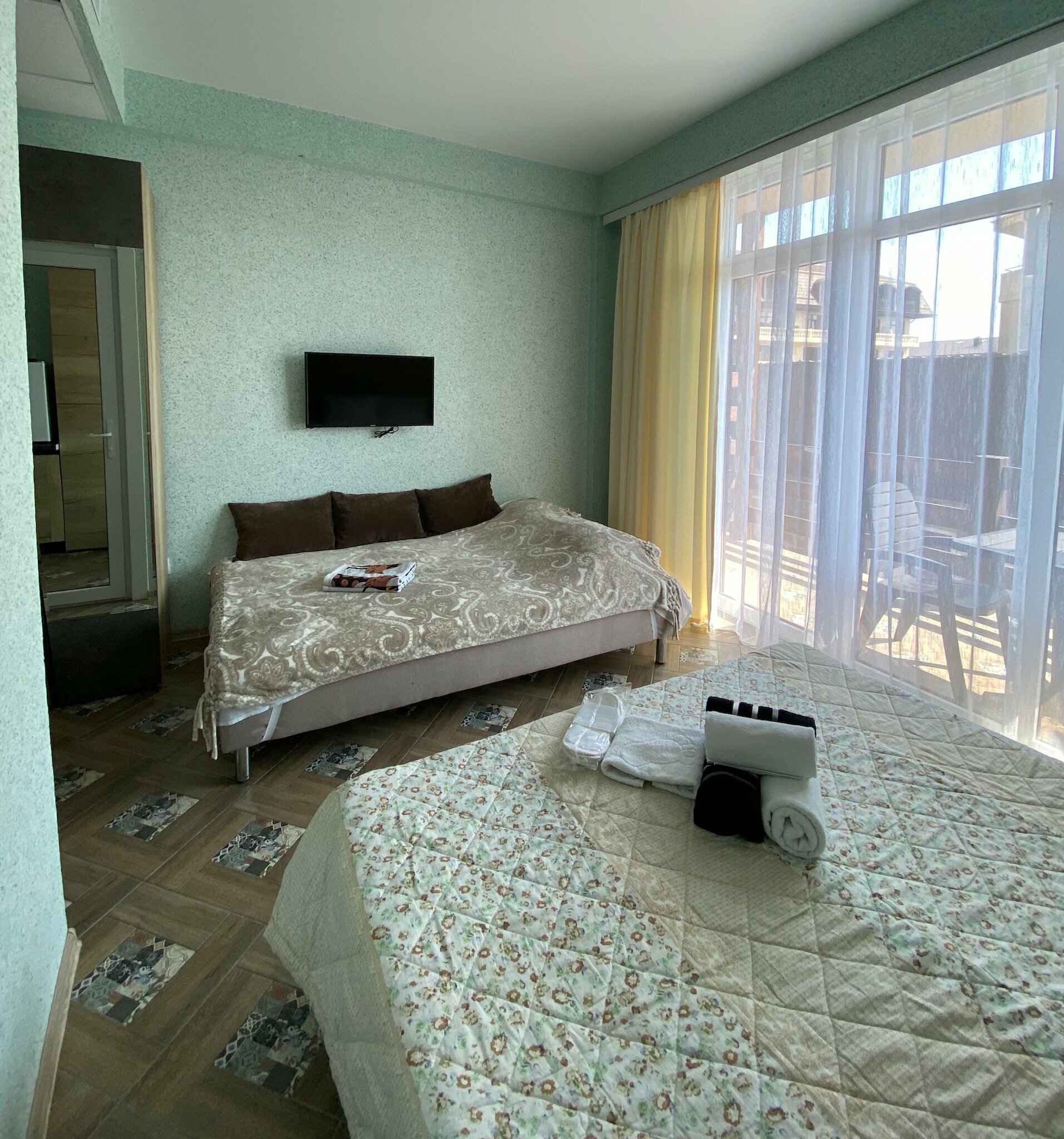 Четырехместный номер с балконом