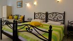 Стандартный трехместный номер, вид на море в Rooms & Apartments Archontou