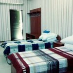 Кровать в 4-местном общем женском номере в Мини-Отель Гостевой Дом