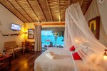 Superior Beach Front Bungalow в Отель Secret Garden Beach Resort