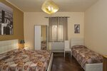 Улучшенный четырехместный номер в Hotel Il Giardino
