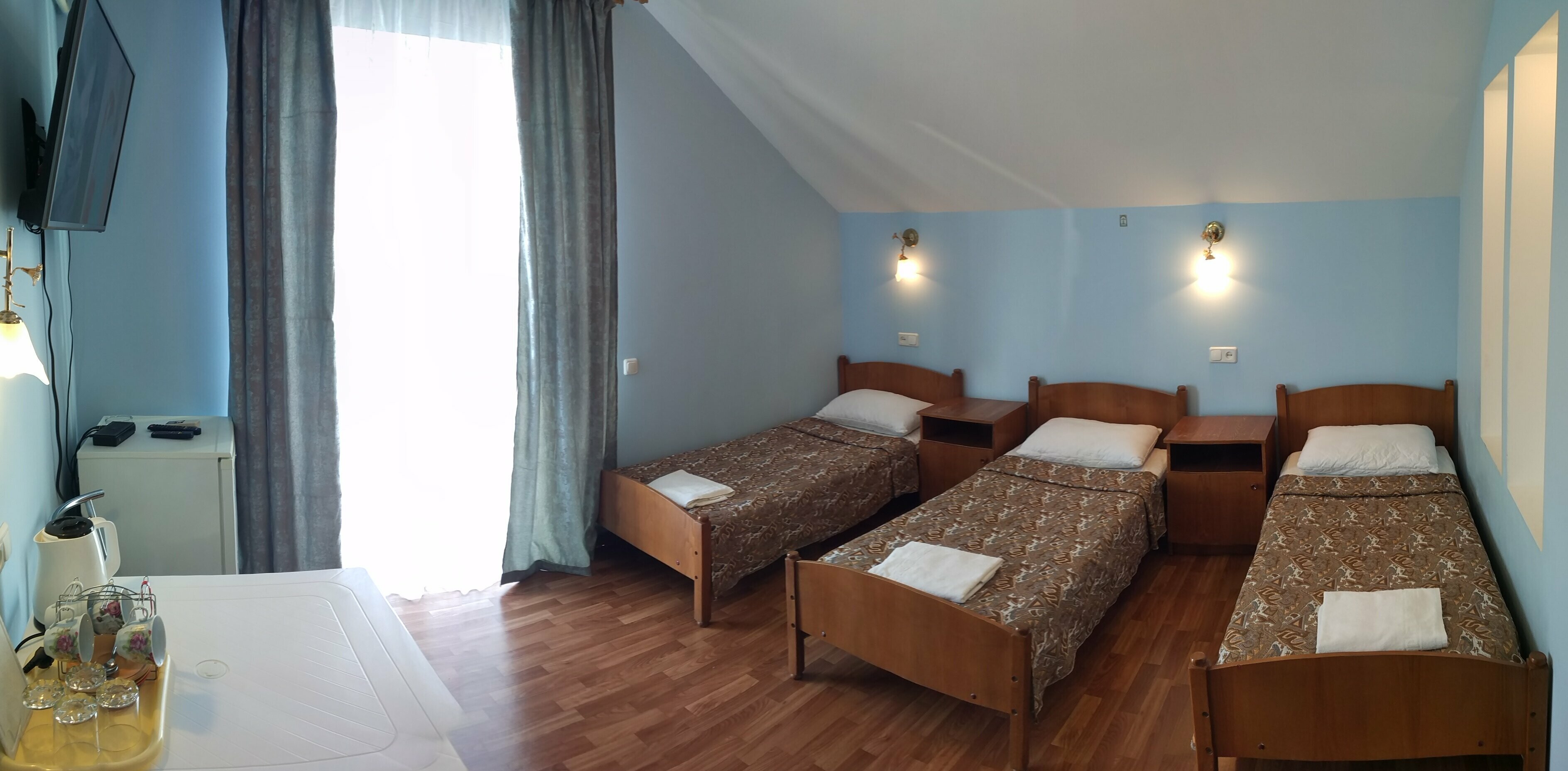 Трехместный номер с балконом