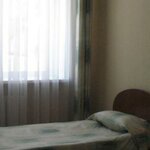Номер стандарт с 2 односпальными кроватями в Гостиница Каргополь