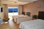 Четырехместный номер в Hôtel Club Al Moggar