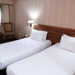 Номер стандарт с 2 односпальными кроватями в Le Grande Plaza Hotel