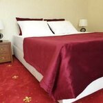 Номер люкс полулюкс с 1 двуспальной кроватью в Гранд отель Абхазия