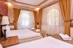 Семейный трехместный номер в Turkevi Butik Otel