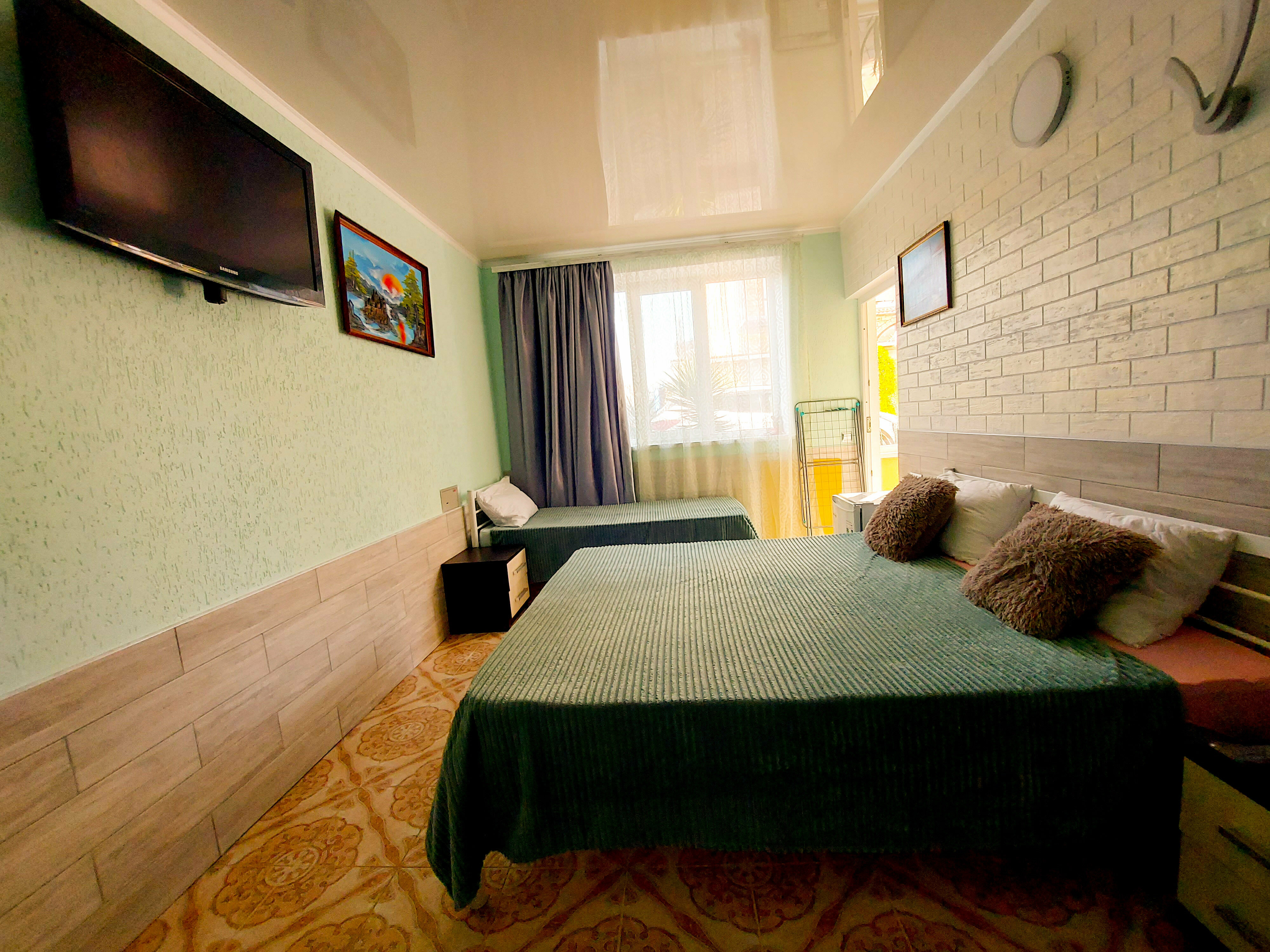 Улучшенный четырехместный номер