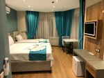 Семейный трехместный номер в Akcay Mas Palmiye Otel