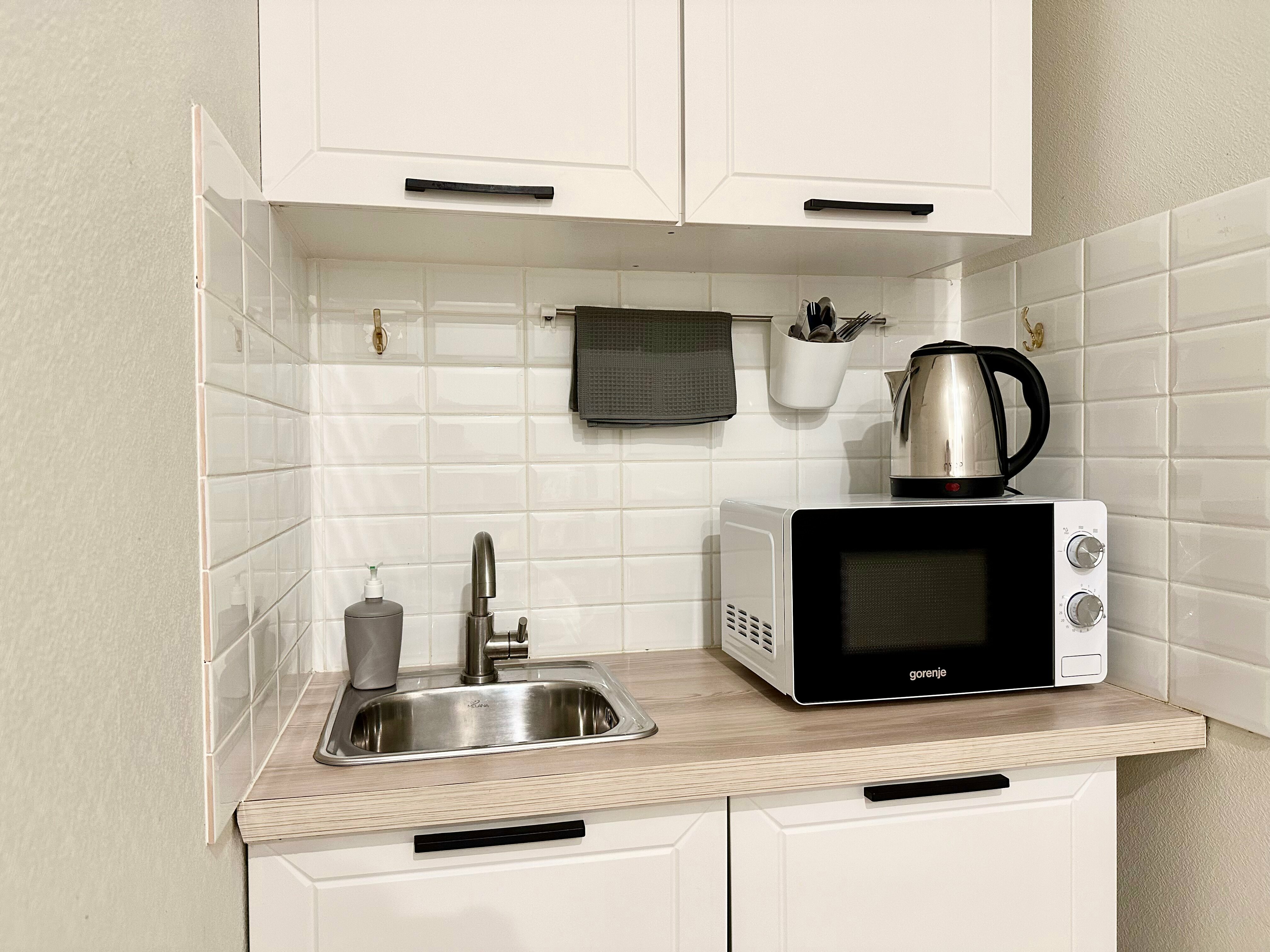 Двухместный номер с двуспальной кроватью и дополнительной кроватью