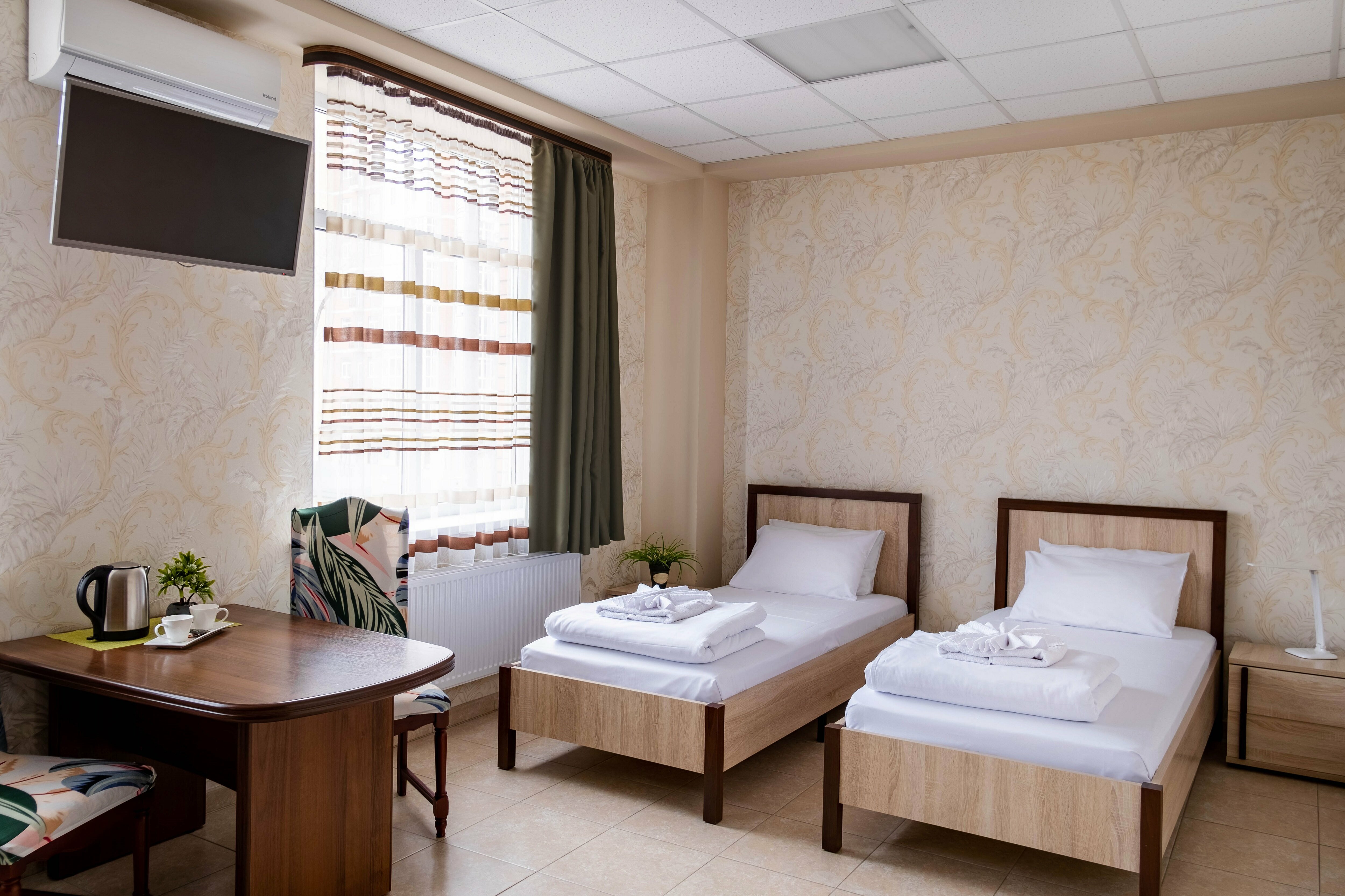 Двухместный номер с 2 отдельными кроватями и душем