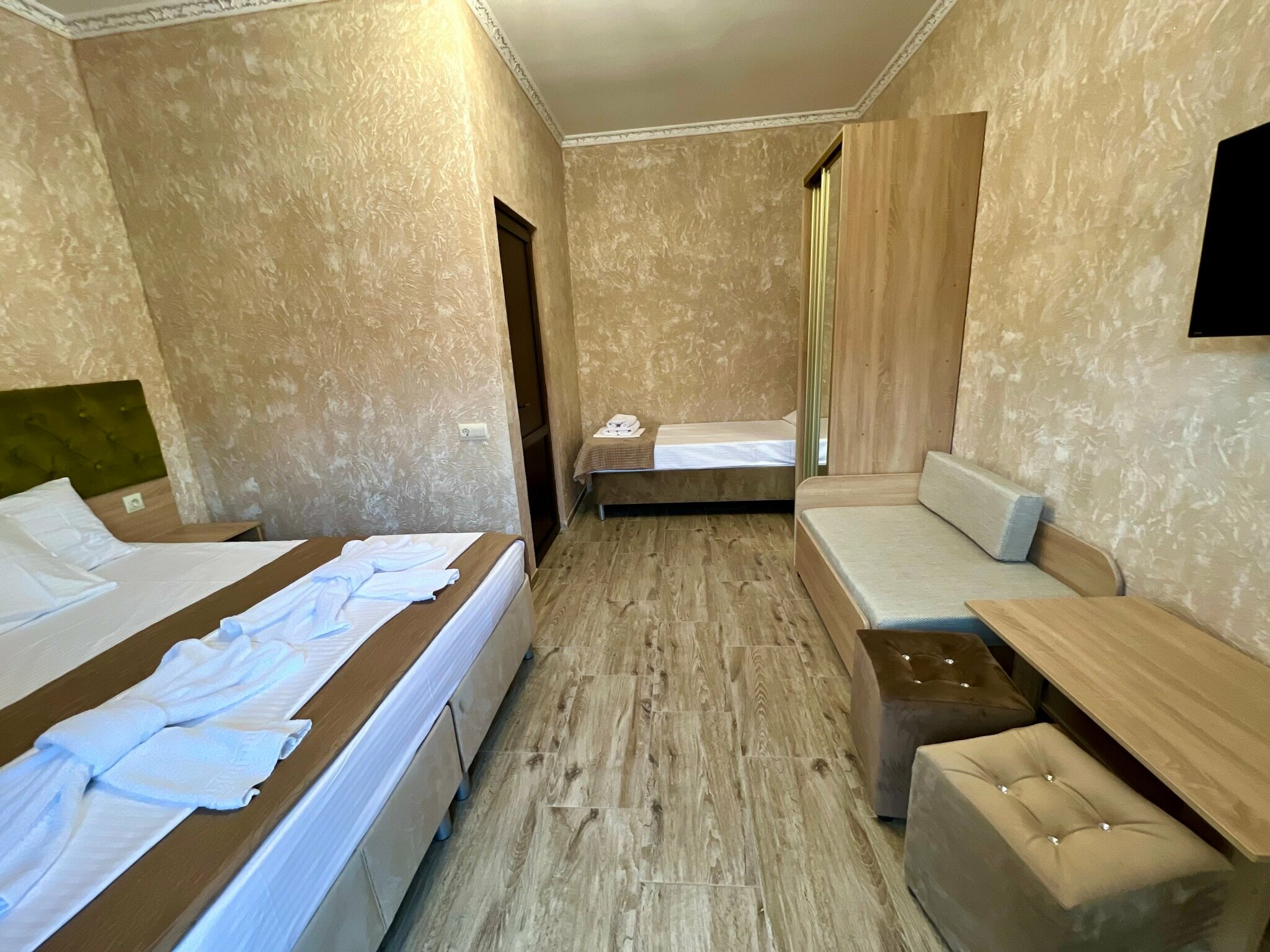 Трехместный номер Делюкс