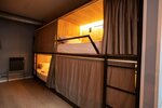 Капсула в общем 10-ти местном номере в Linna Hostel