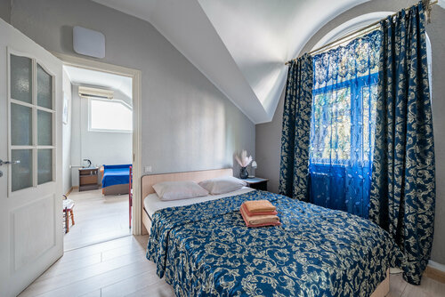 Четырехместный номер с балконом