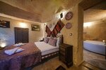 Deluxe Double Cave Room with Jacuzzi в Emit Cave Hotel