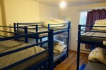 Общее спальное помещение (Bed in 6 mixed dorm) в Saint James Backpackers