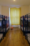 Общее спальное помещение (Bed in 8 mixed dorm) в Saint James Backpackers