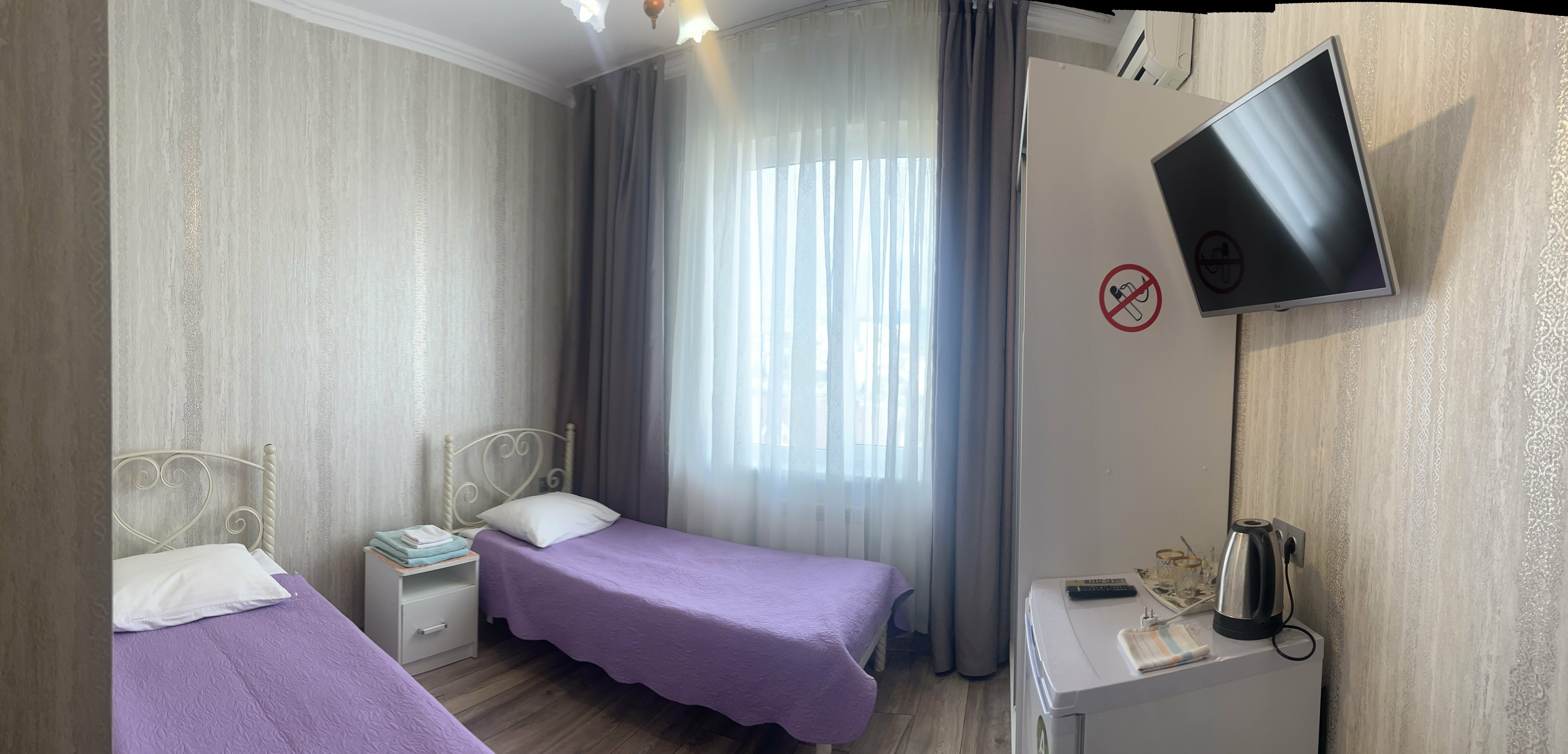 Стандартный двухместный номер с 2 отдельными кроватями, вид на сад