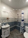 Четырехместный номер с душем в Домик в деревне