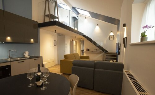 Дизайнерский дуплекс, 2 спальни, вид на горы (South maisonette) в Residenza Alto Garda